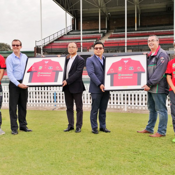 Sherwood Luo (L) & Roger Luo (R) presented with personalised shirts by Scott Dalby & Chris Anson of Souths Referees